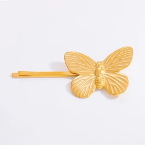 Detailed view of a golden butterfly hair clip made of high-quality stainless steel