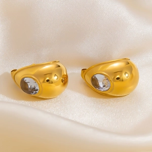 Detail shot of 18K gold plated thick hoop earrings with a sparkling zircon inlay