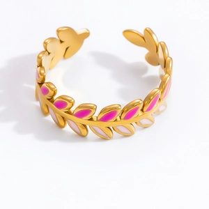 Detail of 18K gold-plated open ring featuring pink enamel olive leaf shaped design