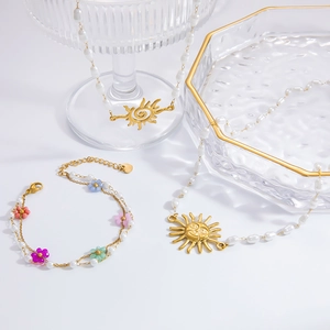 Stainless steel pearl necklace and floral bracelet set with sun pendant jewelry
