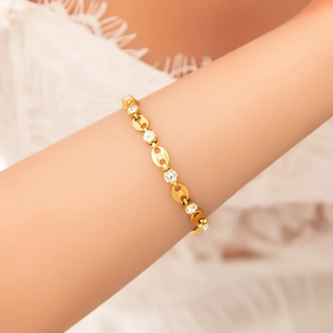 Detail of 18k gold plated hollow chain bracelet with sparkling white zircon stones