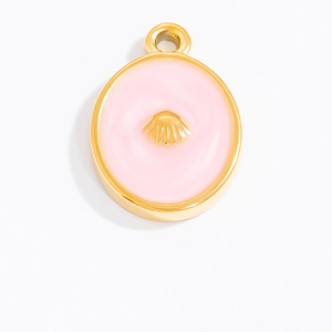 Detail of pink enamel round pendant with a gold shell motif for DIY jewelry
