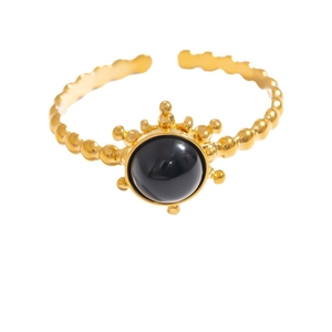 Adjustable golden stainless steel ring featuring a round black obsidian stone and beaded band