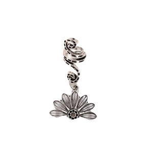 Detail of silver spiral braid ring with a vintage textured petal charm pendant
