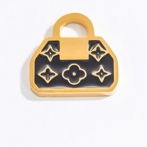 18K Gold Handtaschen-Anhänger mit schwarzem Emaille-Inlay und Blumenstern-Muster