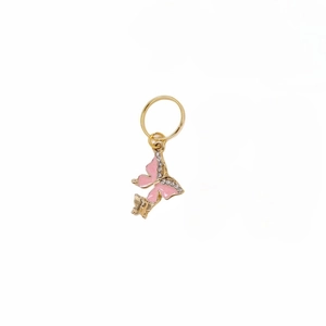 Detail of pink enamel butterfly hair charm with gold alloy plating and crystals