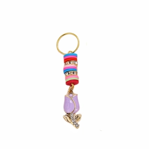 Detailed view of tulip charm with colorful clay beads and sparkling crystal rings