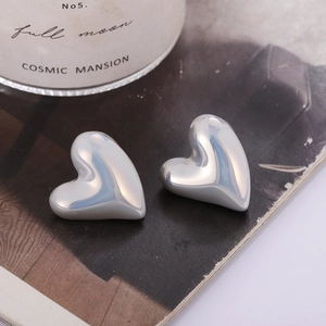 Minimalist S925 silver heart stud earrings with a 3D mirror polished finish for women