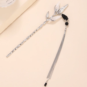 Vintage silver fan hair pin with black teardrop tassels and intricate leaf design