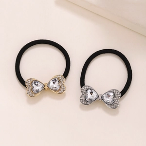 Sparkling rhinestone bow hair ties with heart crystals in gold and silver finishes