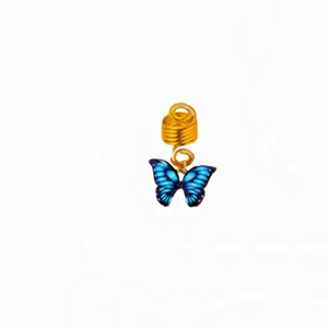 Detailed macro view of a golden hair ring with a blue gradient butterfly charm for braids