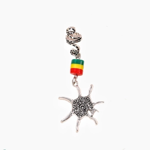 Reggae dreadlock hair ring with star pendant and colorful beads on white background