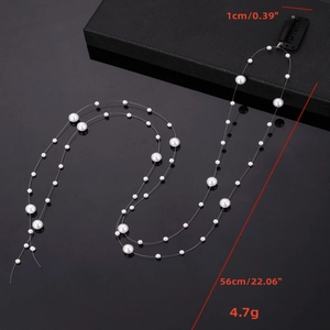 Détail d'une chaîne de cheveux en perles de 56cm avec dimensions et poids