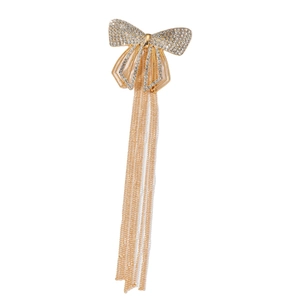 Barrette nœud dorée élégante avec strass brillants et longues pampilles en métal fluide