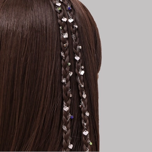 Elegant silver hair chain with heart charms and colorful beads woven into a braided hairstyle