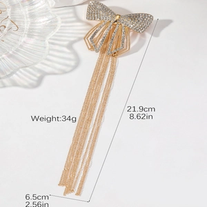 Détails de la barrette à cheveux nœud en strass brillants avec de longs pompons fins