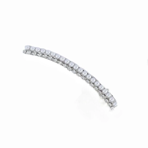 Detail of silver hair clip with double row of white pearls and sparkling rhinestones
