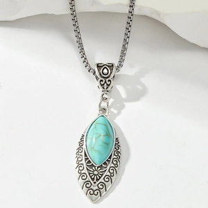 Pendentif vintage en argent avec turquoise et motifs bohémiens complexes gravés