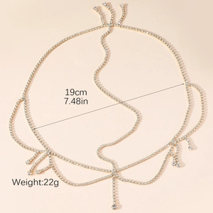 Elegant gold tassel hair chain with sparkling rhinestones in a multi-layer bohemian style