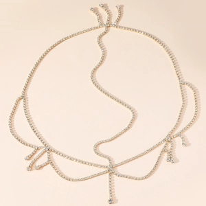 Elegant gold bohemian rhinestone head chain with cascading tassel fringe for hair decoration