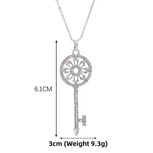 Detailed dimension view of vintage key pendant necklace with silver rhinestones