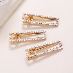 Set of three rectangular gold alloy hair clips with sparkling AB iridescent rhinestones