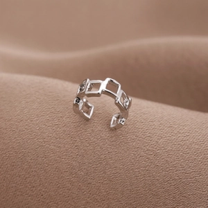 Minimalist silver U-shaped geometric square ear cuff with a polished hollow metal design