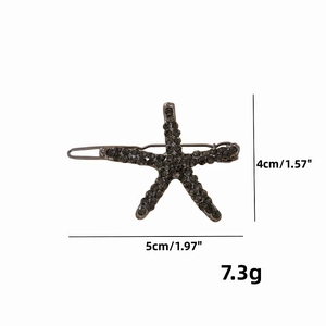 Barrette étoile de mer avec strass gris foncé sur base métal, guide de taille 5cm