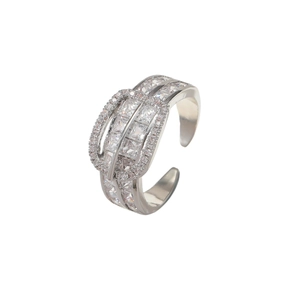 Detail of silver-colored multi-layer crisscross ring with pavé-set cubic zirconia stones