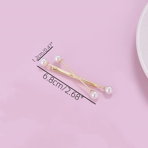 Detailed view showing the 6.8cm length of elegant gold pearl hair clips for women