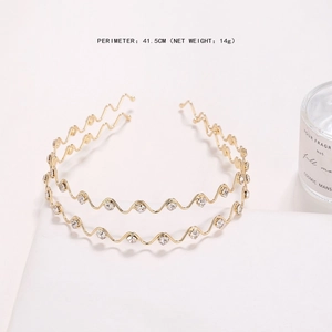 Elegant gold double-layered wavy headband with rhinestones for a minimalist luxury look
