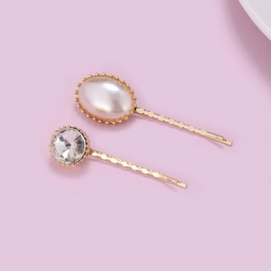 Elegant gold hair clips set with white pearls and clear rhinestones for women