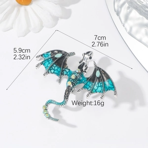 Detailed dragon brooch size view 7cm x 5.9cm with teal blue enamel and crystal inlay