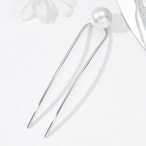 Elegant U-shaped silver hairpin with a large white pearl for hair styling on white background