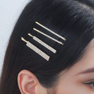 Set di quattro fermagli per capelli dorati con strass eleganti in design sottili e larghi