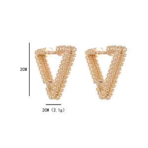 Vintage gold triangle hoop earrings with detailed granular texture and geometric design