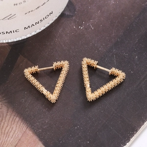 Vintage gold geometric triangle earrings with granular texture and hinged hoops