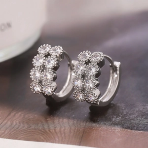 Elegant silver U-shape hoop earrings with micro-pave cubic zirconia floral clusters