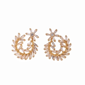 Elegant gold leaf earrings with baguette-cut zircons and flower motif in Greek style