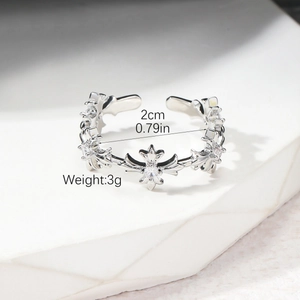 Vintage silver-tone cross star ring with zircon stone and adjustable open band design