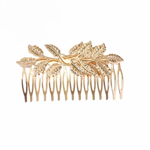 Golden bridal hair comb with baroque leaf design and metallic branch texture