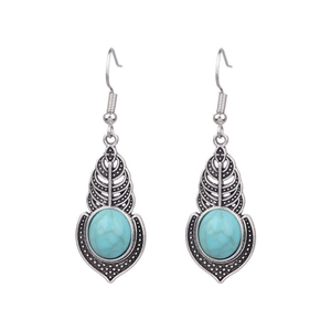 Bohemian turquoise drop earrings with vintage silver leaf motifs and ethnic design