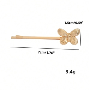 Barrette papillon dorée élégante avec texture métallique et design minimaliste de style Y2K