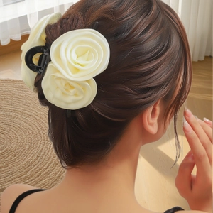 Elegant beige rose fabric hair claw clip with satin finish petals for women's updos