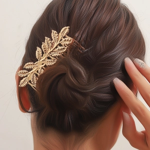 Elegant gold leaf hair comb accessory for bridal hairstyles and vintage updo decoration