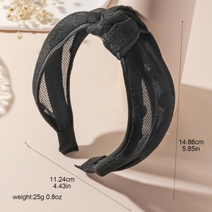 Sparkly black mesh twisted headband for women with glitter fabric and knot detail