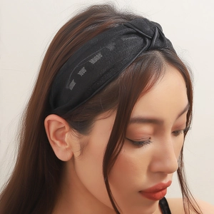 Elegant black knotted mesh headband with sparkling fabric texture and wide side band