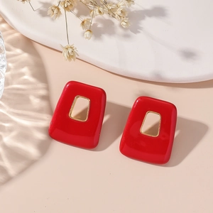 Vintage red trapezoid earrings with gold hollow frame and high-gloss resin finish