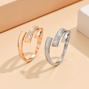 Adjustable bypass rings in gold and silver finish with micro-pave cubic zirconia accents