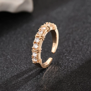 Adjustable cross O-ring in gold-plated brass with seven round zircon stones for women